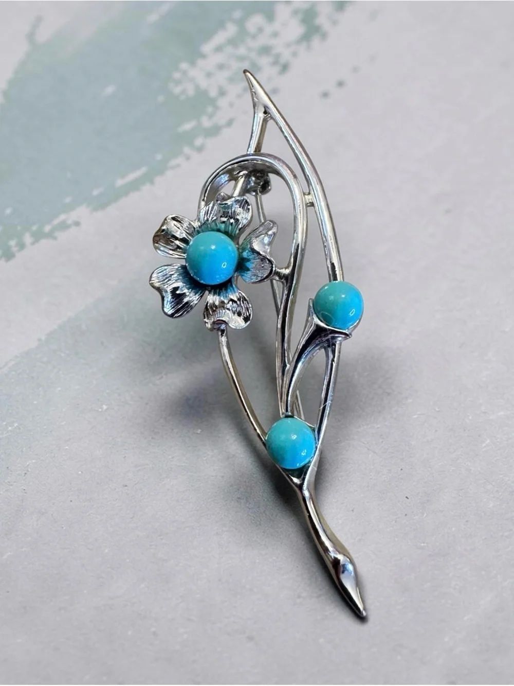 Silver Floral Brooch with Turquoise colored Blue Beads